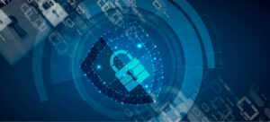 The image shows a person typing on a laptop, with a digital security lock symbol superimposed over it, representing cybersecurity and data protection